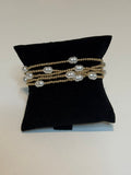 Petite gold and pearl bracelet stack